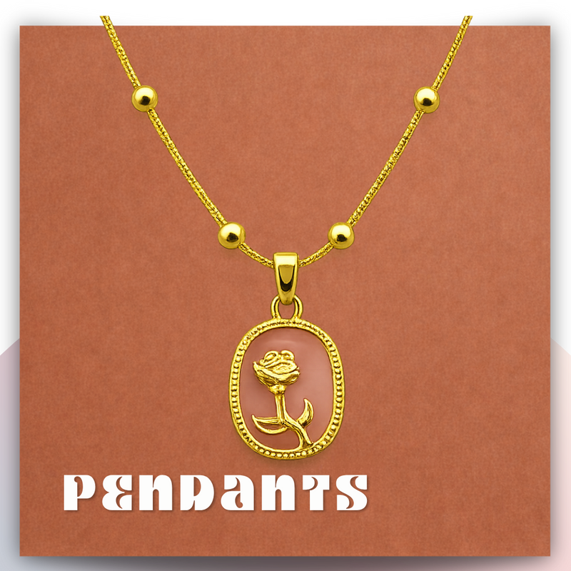 Gold heart-shaped locket pendant with mother-of-pearl and pink floral detail on a gold chain against a brown background. | Videyti