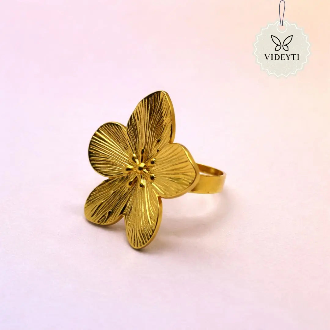 Gold stainless steel five-petal engraved floral ring; adjustable Korean-style anti-tarnish jewelry.