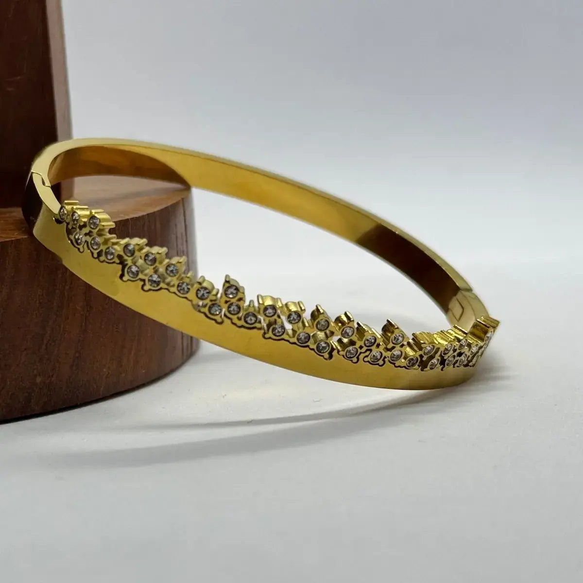 Golden crystal arc bangle bracelet for women