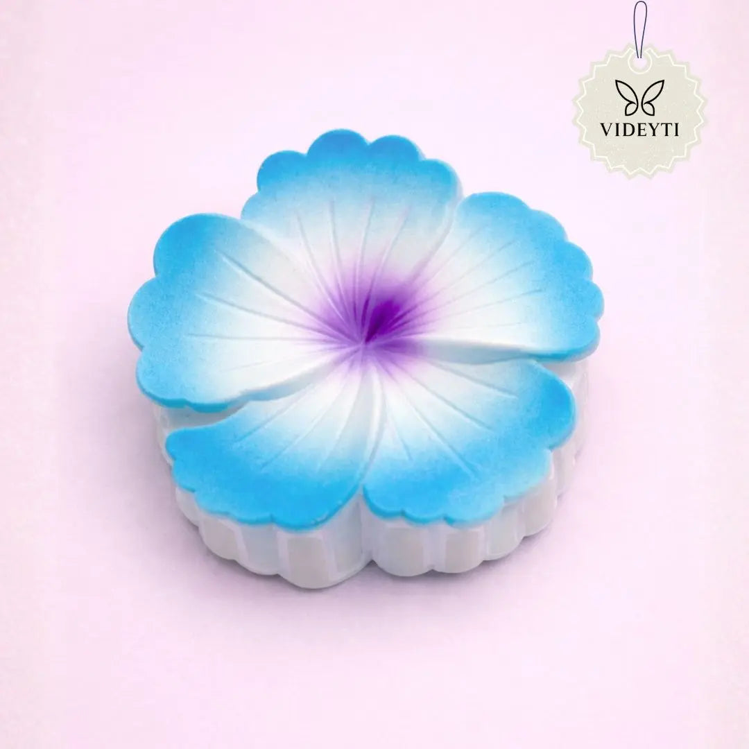 Blue flower hair claw clip with purple center