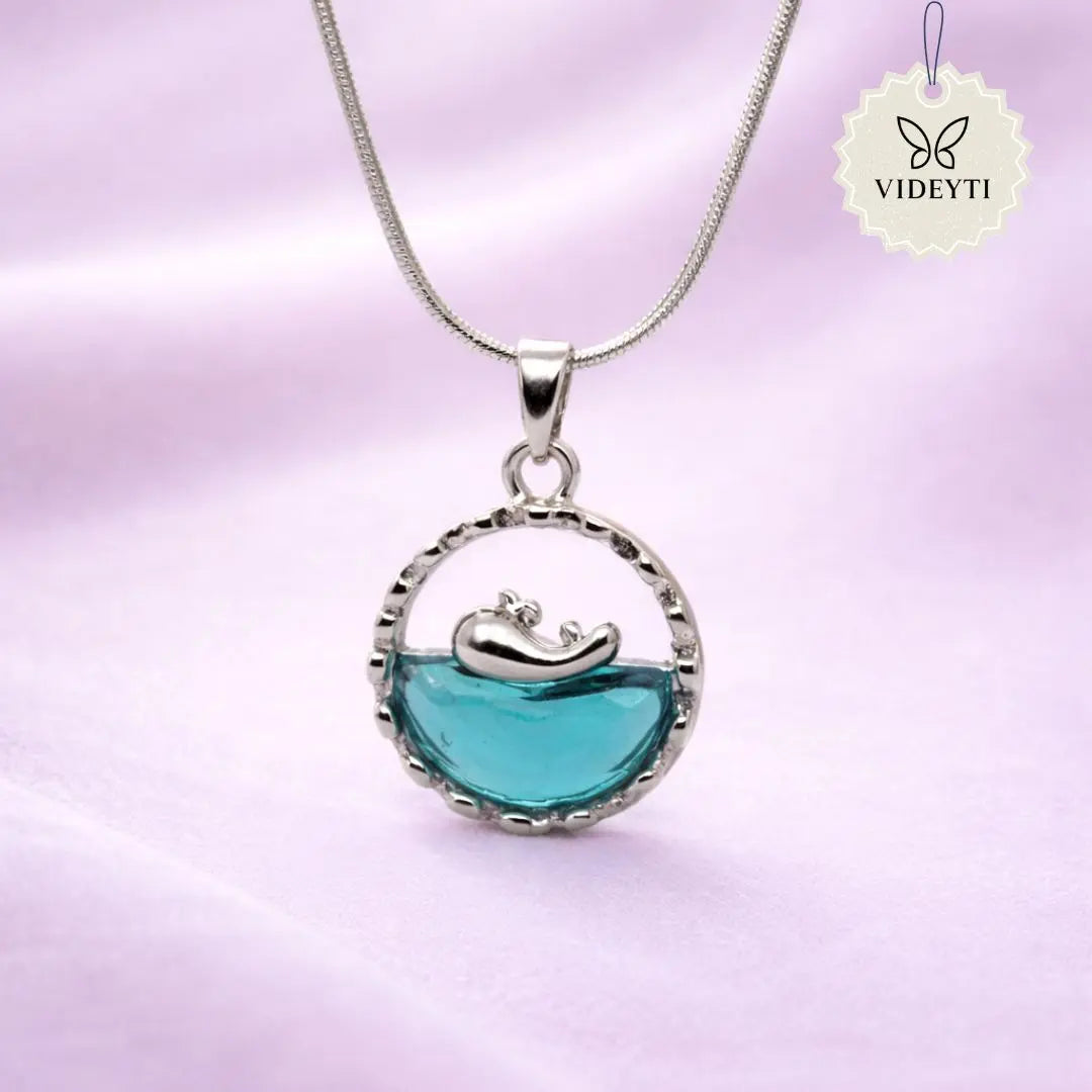 Whale ocean pendant necklace with blue enamel detail and stainless steel chain included, minimalist sea-inspired jewelry