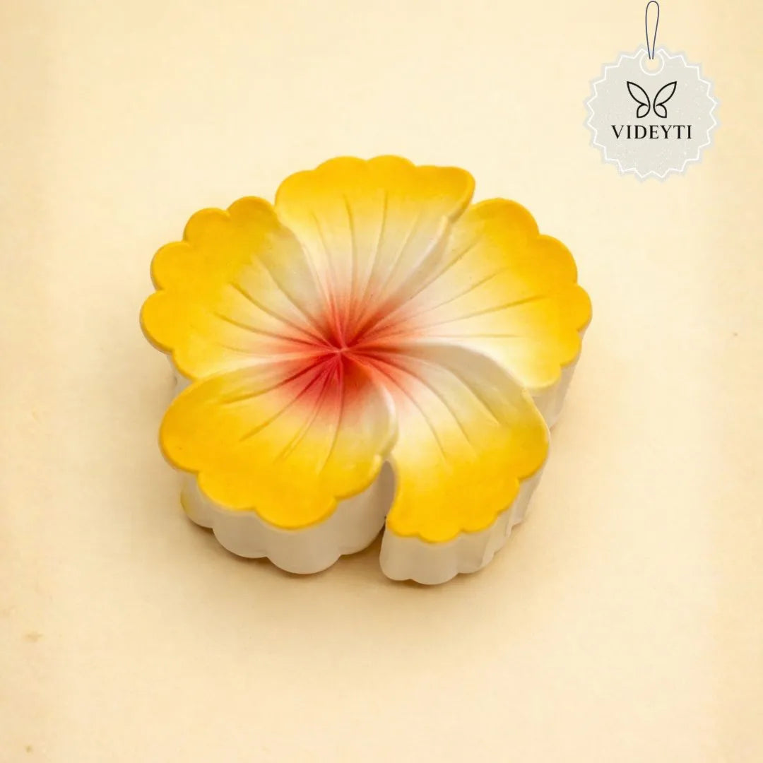 Yellow flower hair claw clip with red center