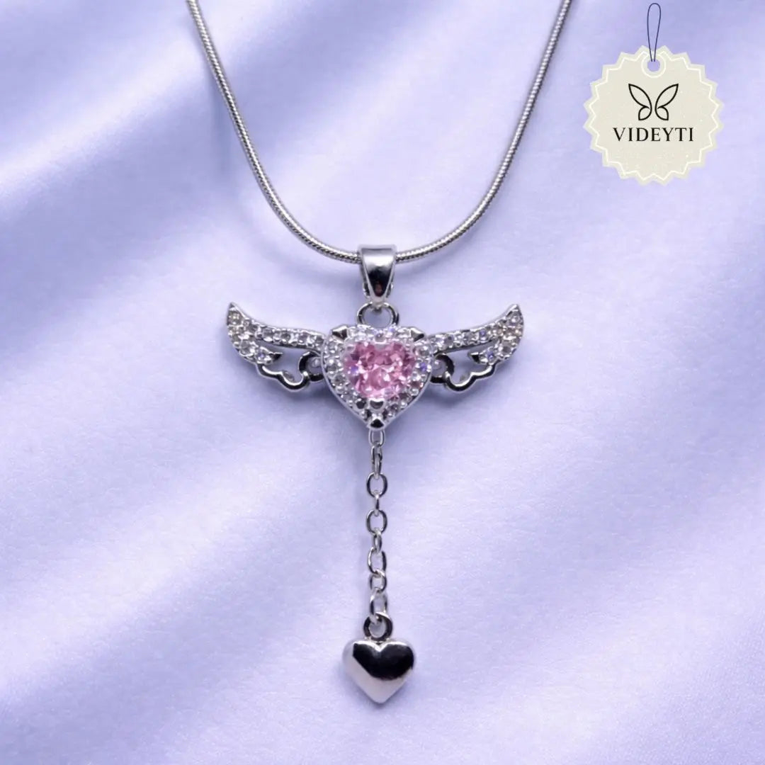 Silver angel wings necklace with pink crystal heart