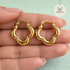 Scalloped hoop earrings with polished gold-tone finish