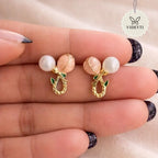 Gold-tone pearl leaf stud earrings