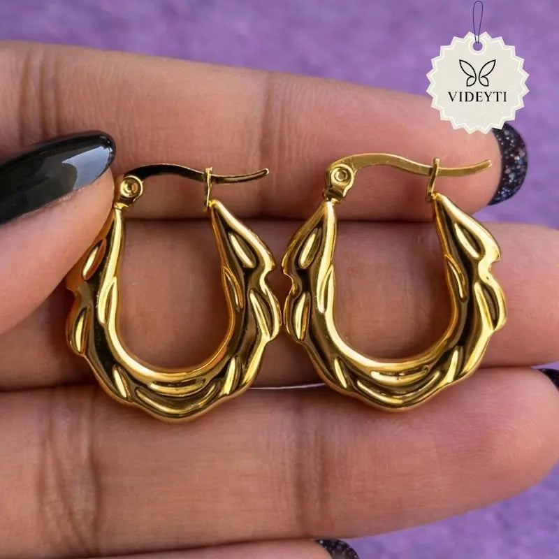 Gold-tone sculpted hoop earrings