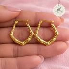 Bamboo-inspired hexagonal gold-tone hoop earrings