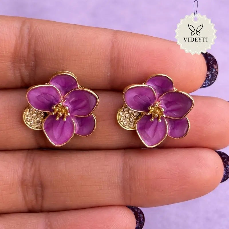 Gold-tone purple enamel floral stud earrings