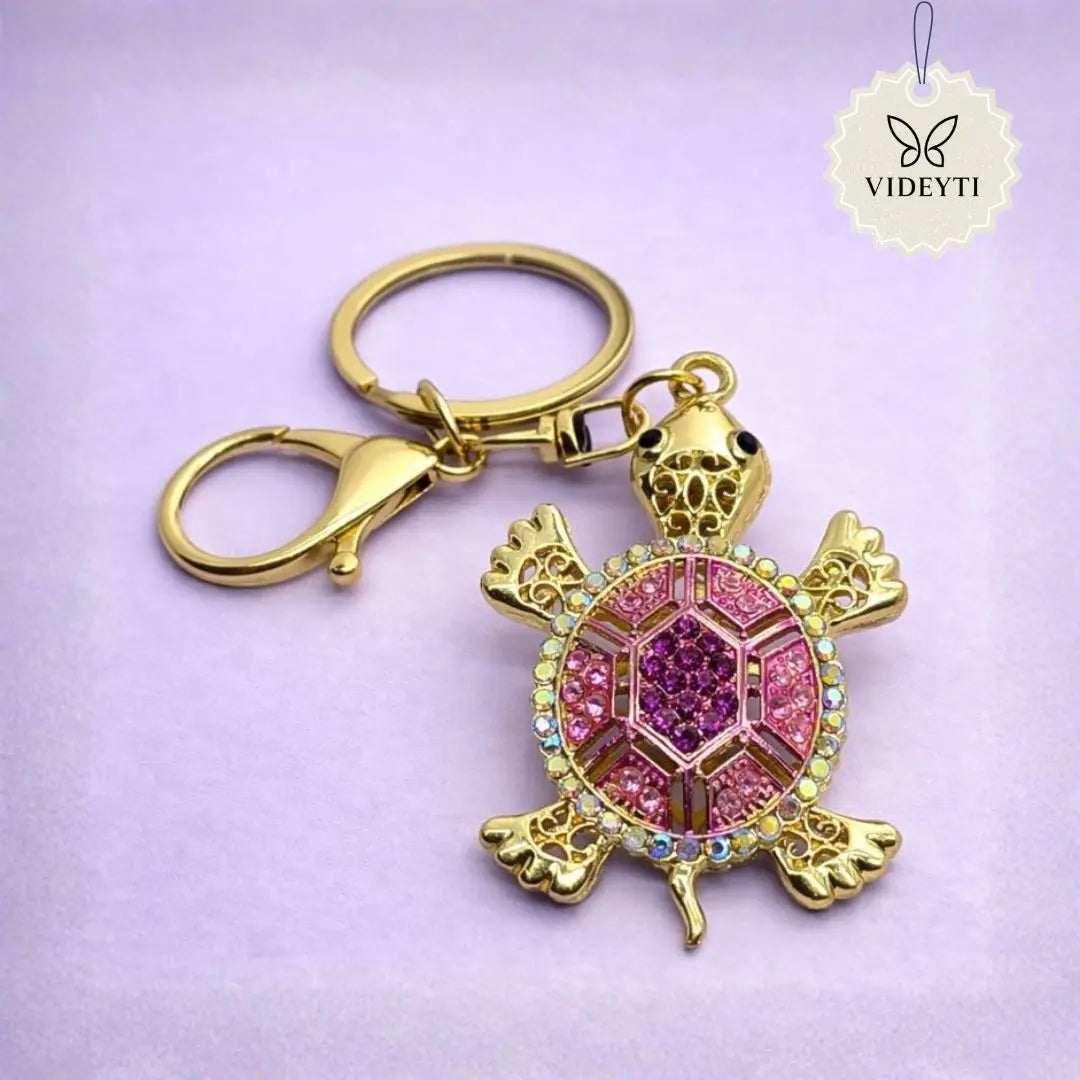 Rhinestone turtle keychain with gold clasp and pink crystal shell