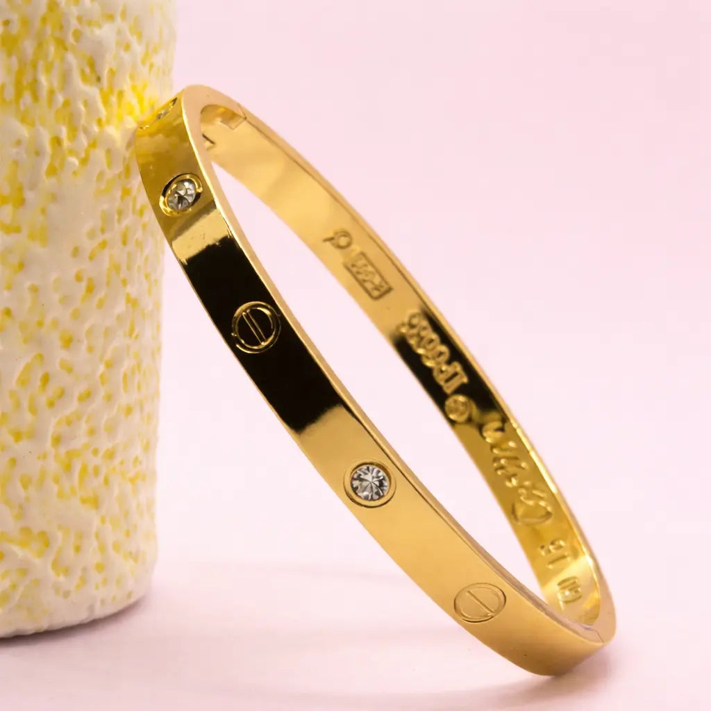 Luxury golden screw bangle bracelet with crystal accents