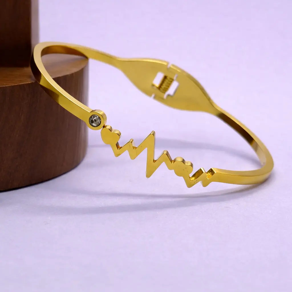 Golden heartbeat design bangle bracelet for women