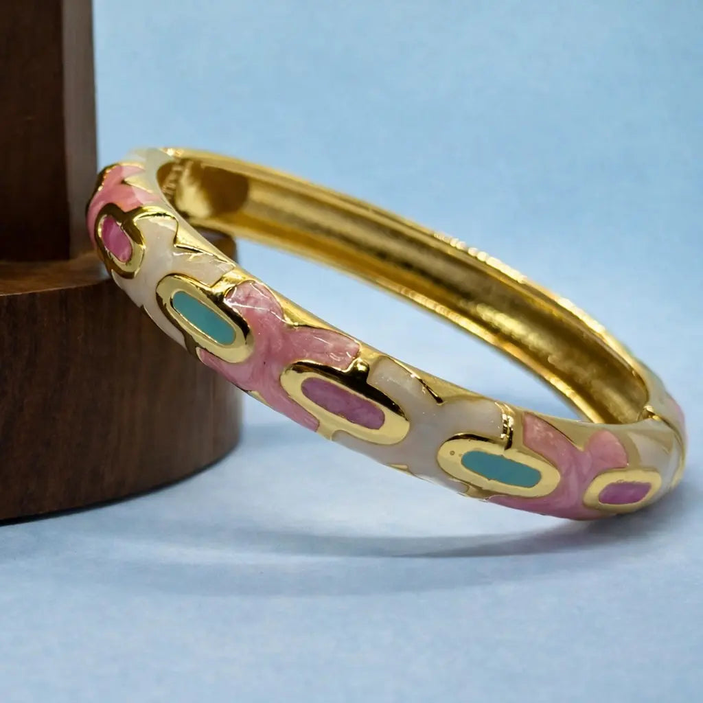 Golden enamel accent bangle in pink and blue