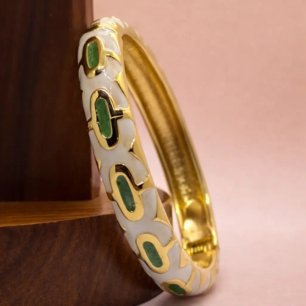 Golden enamel accent bangle in white and green